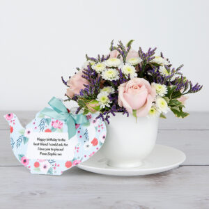 Bubbles Spray Roses, Lilac Limonium and Pittosporum inside Bone China Teacup and Saucer